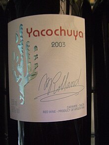 Michel Rolland's signature on a bottle of the Argentine wine Yacochuya which Rolland owns as part of a joint venture in Cafayate. L'indetronable Michel Rolland.jpg