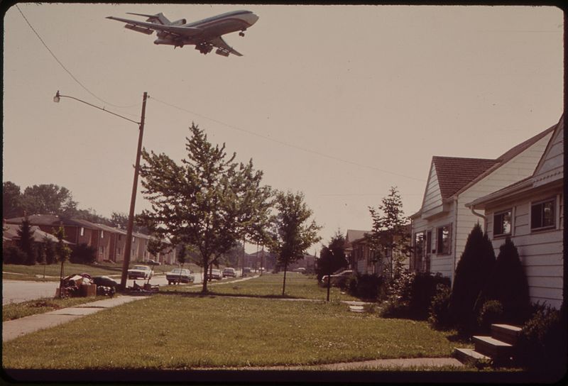 File:LOW FLYING PLANE IN BROOK PARK, JUST OUTSIDE CLEVELAND. THESE HOMES ARE IN THE LANDING PATTERN FOR NEARBY HOPKINS... - NARA - 550156.jpg