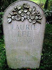 Laurie Lee's grave within the village churchyard. The inscription reads He lies in the valley he loved