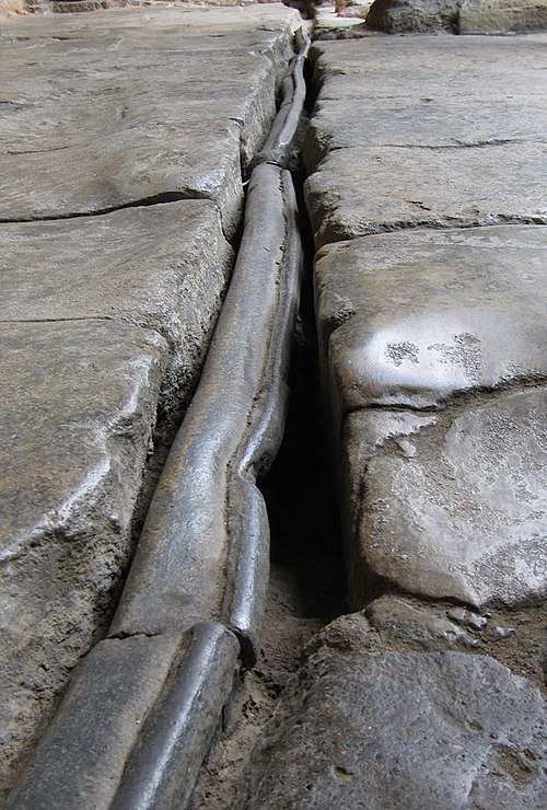 Roman lead pipe with a folded seam, at the Roman Baths in Bath, England