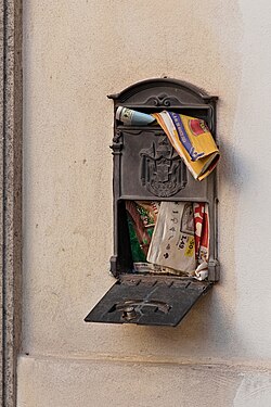 Overflowing mailbox in Sutri, Italy