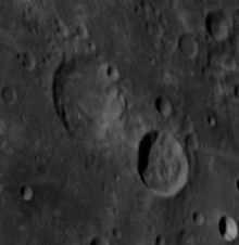Oblique Apollo 14 Hasselblad camera image. Malyy is largest crater, above left of center, and Malyy G is below right of center Malyy crater Malyy G crater AS14-71-9889.jpg