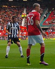 Obertan (right in the number 26 shirt) in a Manchester United shirt during Gary Neville's testimonial game against Juventus Marco Motta & Gabriel Obertan.jpg