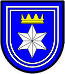 a mullet facetted - Azure; a facetted six pointed star [mullet] argent ensigned with a gable crown or, the whole within a double tressure argent - Landenhoven, South Africa Mullet facetted wiki.jpg