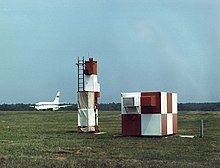 The NASA 737 research aircraft on the Wallops runway in 1987 with the microwave landing system equipment in the foreground NASA 737 research aircraft.jpg