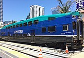 Left: A COASTER Bombardier BiLevel cab car at San Diego's Santa Fe Depot.