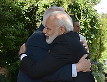 Narendra Modi's warm visit to Israel, hugging Former President Reuven Rivlin in 2017 Narendra Modi visit to Israel, July 2017 (5803).jpg