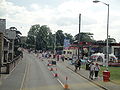 Fairlee Road, Newport, Isle of Wight photographed during the Isle of Wight Festival 2010. As can be seen, the road has been restricted to only allow traffic towards Newport due high pedestrian numbers walking towards the Festival site over the weekend, causing buses and other vehicles to be diverted along other roads. After the end of each act on the night the road is closed in both directions. Fairlee Service Station can be seen to the left of the photo, which also stops selling petrol over the weekend and instead serves food.