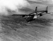 An O-2A fires smoke markers at a target. O-2A fires smoke rocket in Vietnam.jpg