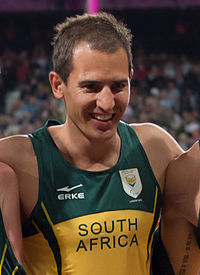 Oscar Pistorius and his team (7940671224) (Fourie).jpg