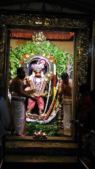 Priest performing rituals after alankaram P 20160611 205150.jpg