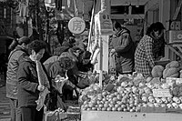People are buying fruits.jpg