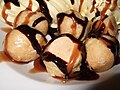 Profiteroles with dessert sauces