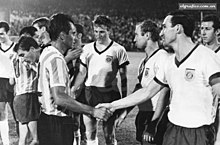 Bayern Munich (in white jersey) during a friendly match v Argentine Racing Club, December 1966 Racing vs bayern saludo.jpg