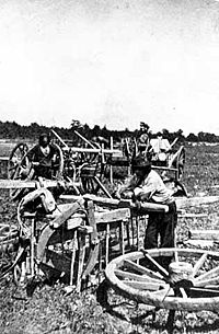 Preparing Red River ox cart at Pembina, North Dakota, for trip to St. Anthony Falls, Minnesota