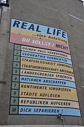 "Real Life" mural (2000) in Leipzig, Germany Ross Sinclair, Real Life, 2000 (1).jpg