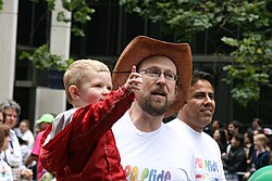 Same-sex male couple with child at the 2008 San Francisco Pride Parade.jpg