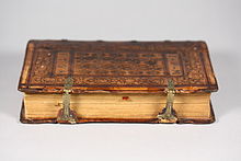 Sammelband of three alchemical treatises, bound in Strasbourg by Samuel Emmel c. 1568, showing metal clasps and leather covering of boards Sammelband CHF edge view.jpg