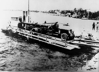 Naval gun being ferried across to Bribie Island, 1939 StateLibQld 2 112856 Naval gun being ferried across to Bribie Island, 1939.jpg