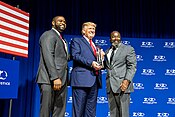 Donalds and President Donald Trump in 2019 with a former inmate freed by the First Step Act The 2019 Second Step Presidential Justice Forum (48959680341).jpg