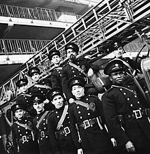 An AFS unit with their fire engine in London, 1941 The Auxiliary Fire Service in London, 1941 D5544.jpg