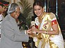 The President, Dr. A.P.J. Abdul Kalam presenting the Padma Shri Award - 2006 to Ms. Shobana Chandrakumar, a well-known Classical dancer, Choreographer teacher and actress, in New Delhi on March 20, 2006 (cropped).jpg