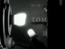 Tom (2002) title.png