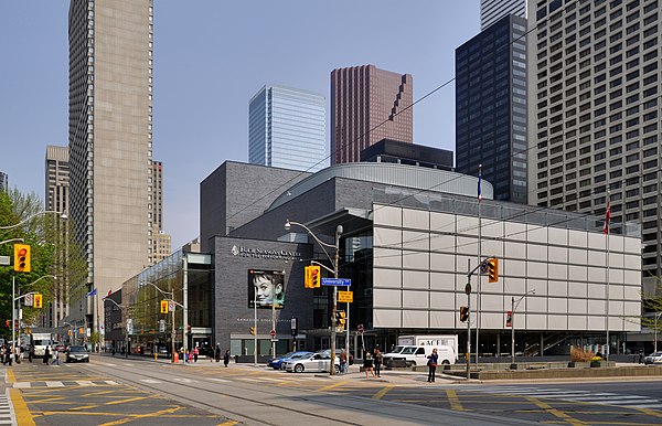 Four Seasons Centre seen from University Avenue with sun shades covering its glazed facade