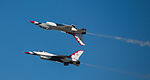 Two USAF Thunderbirds flying inverted - 2012 Arctic Thunder Air Show.jpg