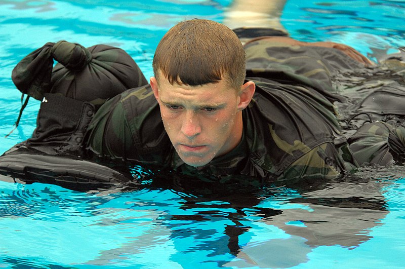 File:US Navy 080722-N-2959L-127 Seaman Apprentice Damien Bell uses his uniform as a floatation device.jpg