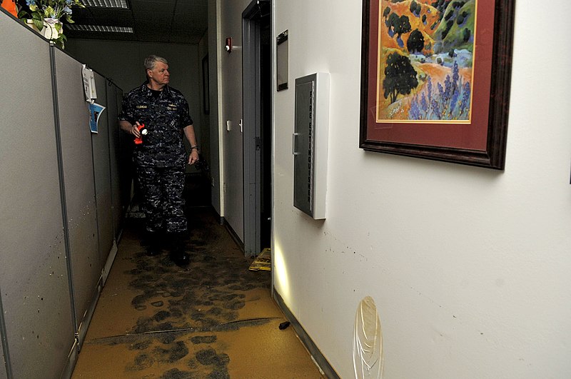 File:US Navy 100503-N-8273J-058 Chief of Naval Operations (CNO) Adm. Gary Roughead views the damaged buildings at Naval Support Activity Mid-South.jpg