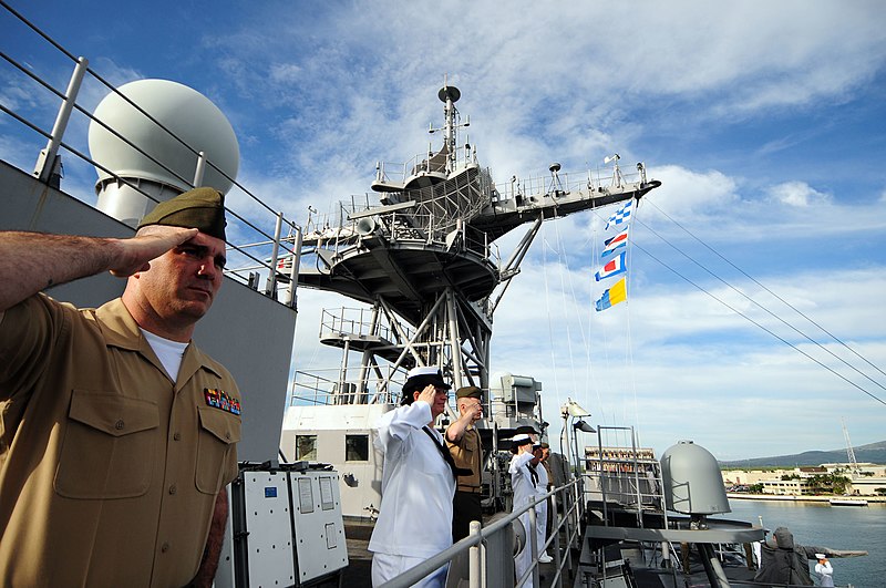 File:US Navy 110301-N-RC734-055 Sailors and Marines aboard the amphibious dock landing ship USS Comstock (LSD 45) render honors as the ship passes the U.jpg