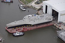 USS Coronado is rolled out in 2011 US Navy 120109-O-ZZ999-001 The littoral combat ship Pre-Commissioning Unit (PCU) Coronado (LCS 4) is rolled-out at the Austal USA assembly bay.jpg