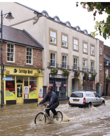 Urban flooding in a street in Morpeth, England