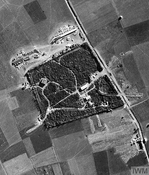 Vertical photographic-reconnaissance aerial of a flying-bomb launch site under construction at Bois Carre, near Yvrench, France - HU 92983 IWM