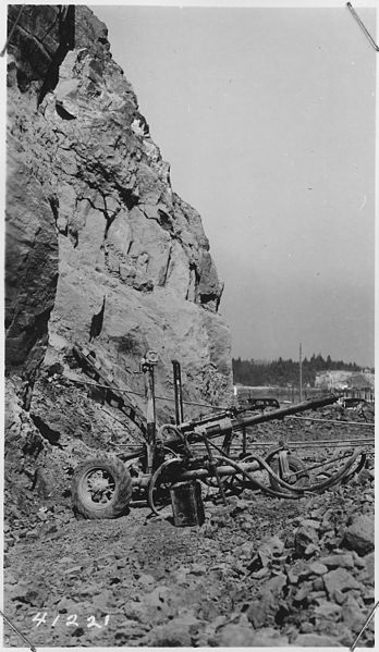 File:View shows wagon drill used in preparations to shoot rock point, Stas. 63-67. - NARA - 298223.jpg