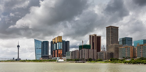 View of the Macau Tower and Macau Peninsula's skyline a stormy day.