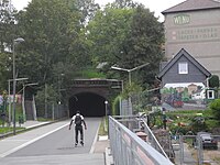 Nordbahntrasse: Rot tunnel at the east portal.  The bike area is released for skating with an additional sign.