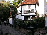 Ye Olde Fighting Cocks in St. Albans, Hertfordshire, which holds the Guinness World Record for the oldest pub in England.