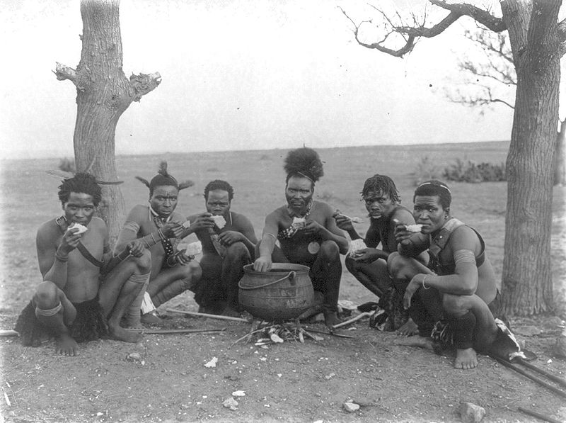 File:Zulu men eating 1920s.JPG