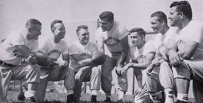 Parseghian (center) and his coaching staff at Northwestern in 1956