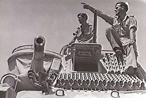 Members of the 2/5th Armoured Regiment with a M3 Grant tank