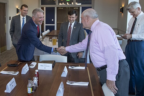 Abraham greeting Secretary of Agriculture Sonny Perdue in 2018