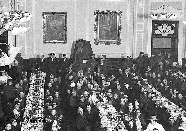 26 December 1915. A Soldiers Dinner in Lewes Town Hall. "The Kiss" is under the cover at the back. Photo by E.Reeves Ltd