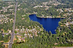 A lake in a wooded area