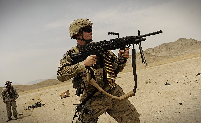 File:Airman firing Mk 48 near FOB Mehtar Lam.jpg