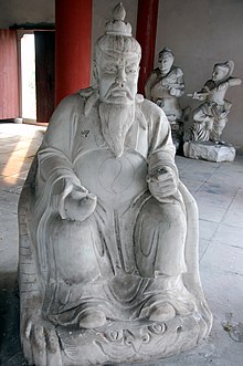 A stone statue of Gongsun Sheng at Hengdian World Studios. Along the River During the Qingming Festival (2112132389).jpg