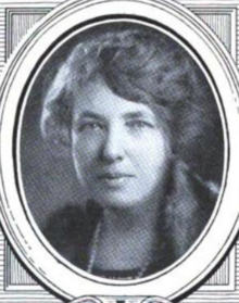 A white woman with sandy-colored hair, in an oval frame