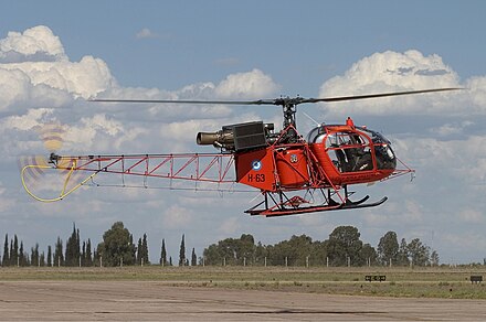 An SA-315 Lama helicopter lifting off from Gabrielli International Airport.