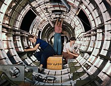 Installation of fixtures and assemblies on a tail fuselage section of a B-17 at the Douglas plant in Long Beach, California, October 1942 B17F - Woman workers at the Douglas Aircraft Company plant, Long Beach, Calif.jpg